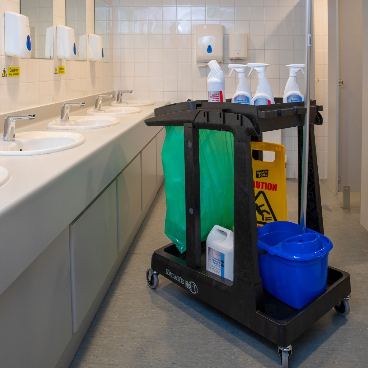 cleaners trolley with cleaning chemicals