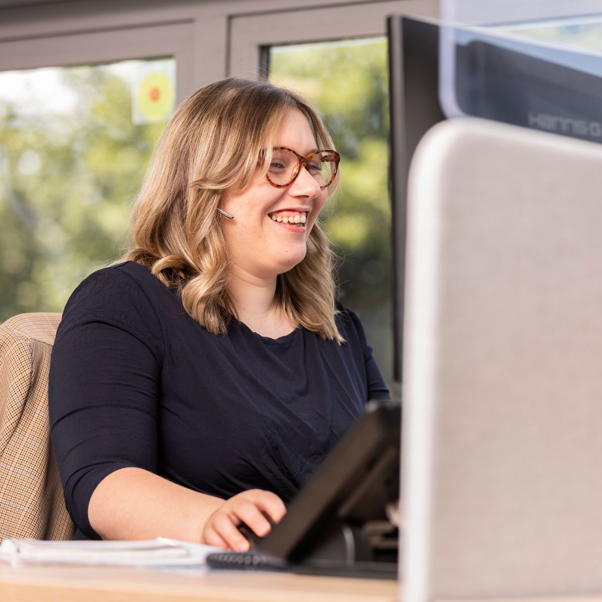 ruth speaking with care home customer on the phone