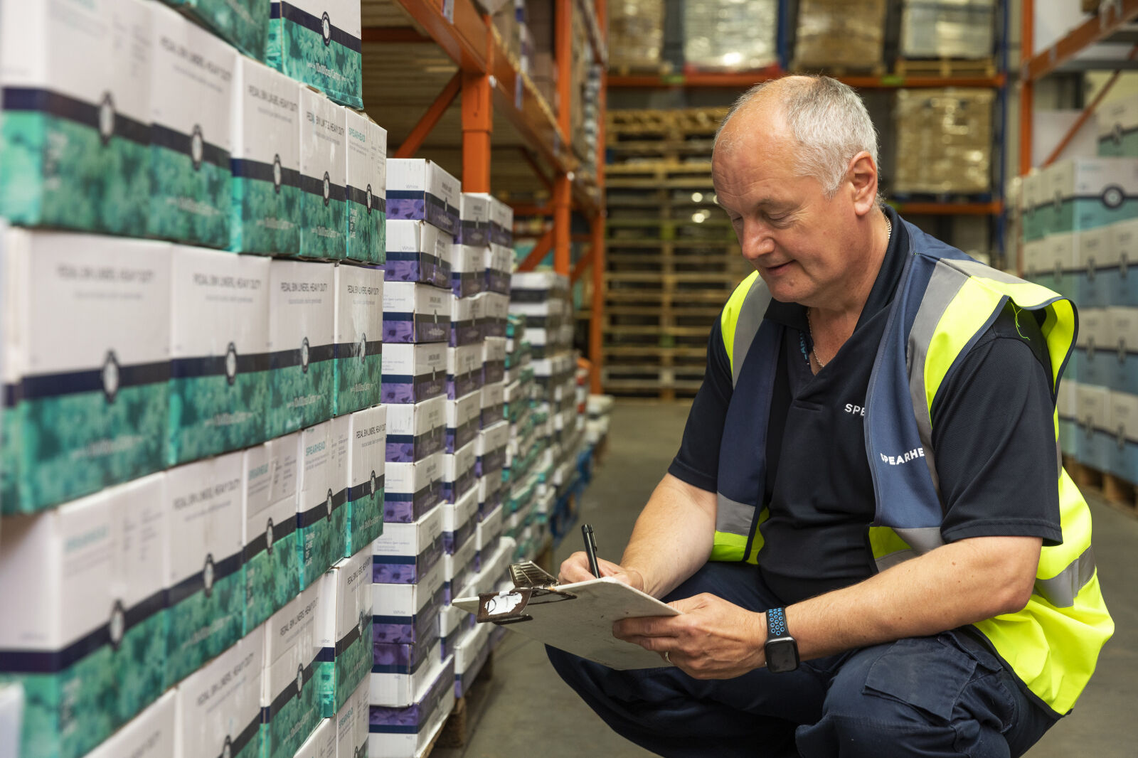 Spearhead Healthcare Warehouse Staff Member Checking Stock