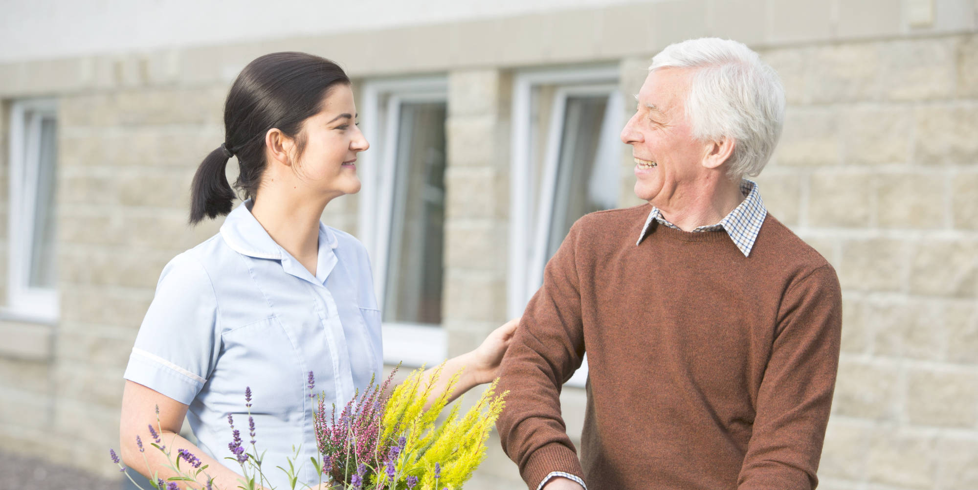 elderly person and carer